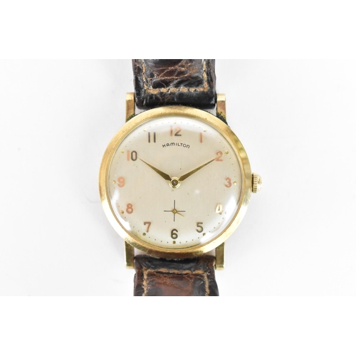 24 - A Hamilton Medallion, manual wind, gents, gold plated wristwatch, circa 1950s, having a silvered dia... 