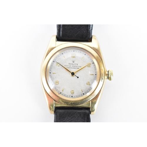 25 - A Rolex Oyster Perpetual Chronometer, bubble back, automatic, gents, 14ct gold wristwatch, circa 194... 