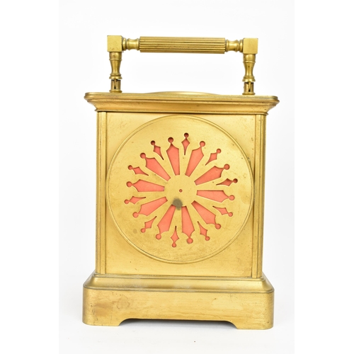 26 - An early 20th century French gilt metal large carriage clock with integrated thermometer and compass... 