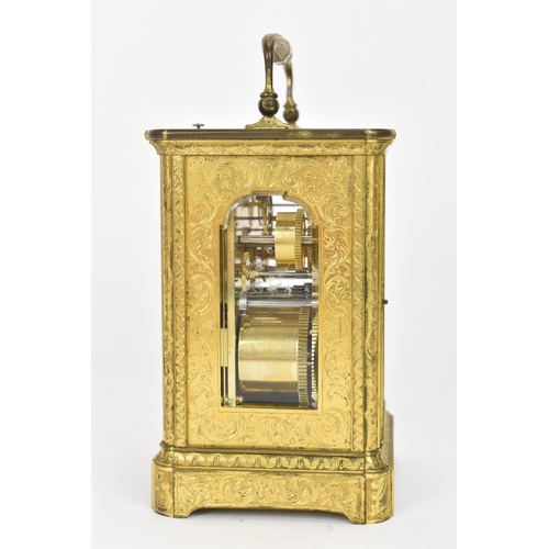 28 - A late 19th century French gilt metal, repeating, alarm and date carriage clock, the white enamel di... 