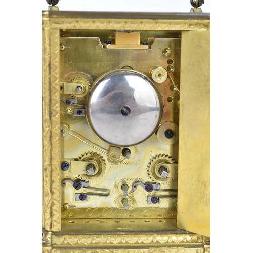 28 - A late 19th century French gilt metal, repeating, alarm and date carriage clock, the white enamel di... 