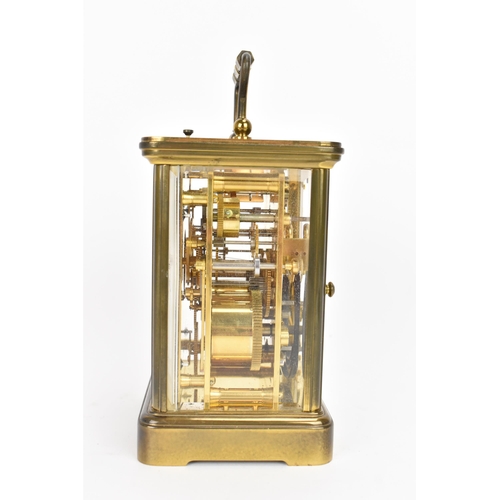 29 - A Matthew Norman gilt metal repeating and alarm carriage clock, the white enamel dial having Roman n... 