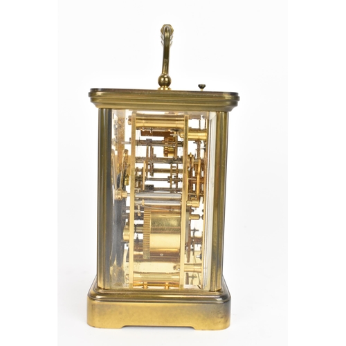 29 - A Matthew Norman gilt metal repeating and alarm carriage clock, the white enamel dial having Roman n... 