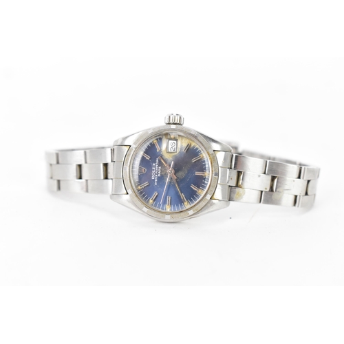 32 - A Rolex Oyster Perpetual Date, automatic, ladies, stainless stell wristwatch, circa 1981, having a b... 