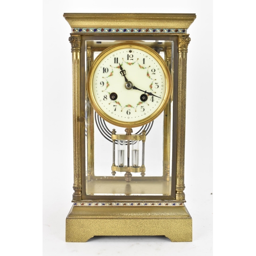 48 - A late 19th/early 20th century French gilt metal and bevelled glass mantle clock, having an enamel d... 