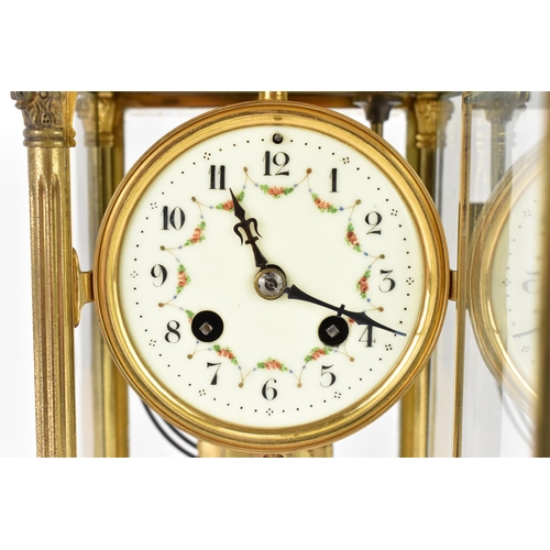 48 - A late 19th/early 20th century French gilt metal and bevelled glass mantle clock, having an enamel d... 