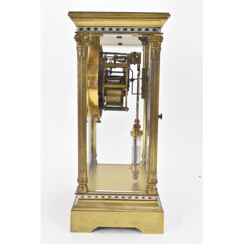 48 - A late 19th/early 20th century French gilt metal and bevelled glass mantle clock, having an enamel d... 