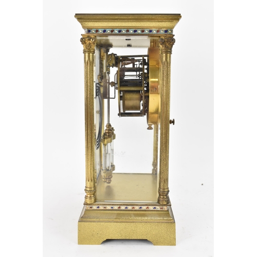 48 - A late 19th/early 20th century French gilt metal and bevelled glass mantle clock, having an enamel d... 