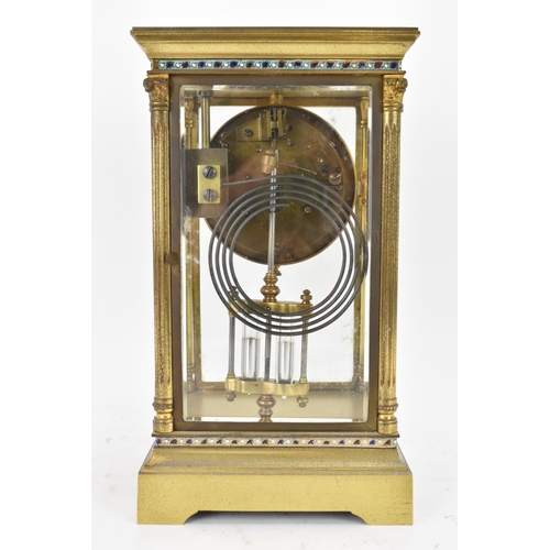 48 - A late 19th/early 20th century French gilt metal and bevelled glass mantle clock, having an enamel d... 