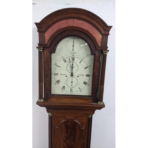 50 - An early 19th century mahogany 8 day longcase clock, having an arched top with pierced grille above ... 