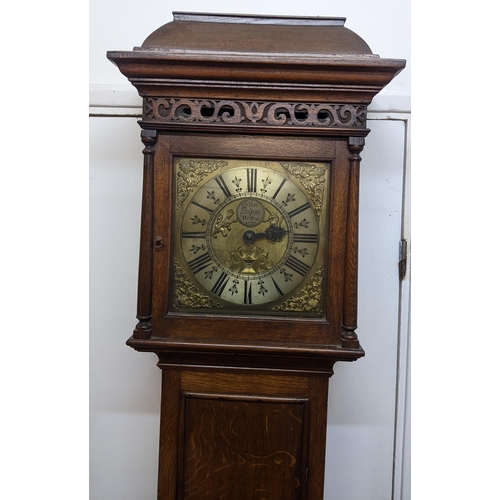 52 - A George II oak cased 30 hour longcase clock, having a moulded cornice, pierced fretwork above turne... 