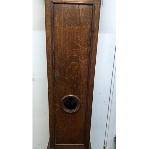 52 - A George II oak cased 30 hour longcase clock, having a moulded cornice, pierced fretwork above turne... 