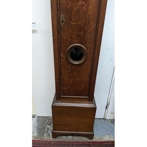 52 - A George II oak cased 30 hour longcase clock, having a moulded cornice, pierced fretwork above turne... 