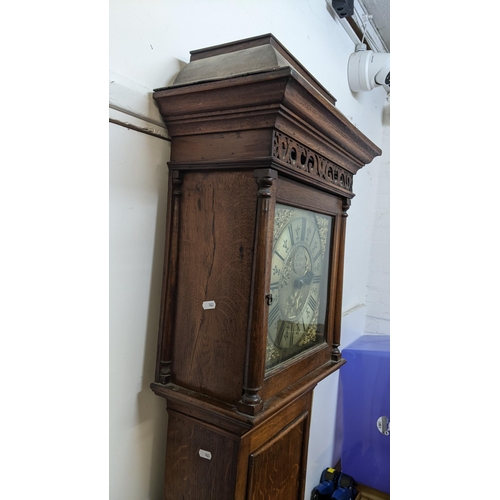 52 - A George II oak cased 30 hour longcase clock, having a moulded cornice, pierced fretwork above turne... 