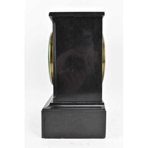 56 - A late 19th century French black slate marble 8 day mantle clock, the white enamel dial having Roman... 