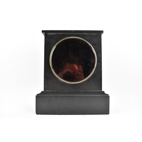 56 - A late 19th century French black slate marble 8 day mantle clock, the white enamel dial having Roman... 