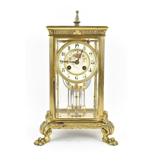 58 - A late 19th century French gilt metal and beveled glass mantle clock, the dial having a floral paint... 