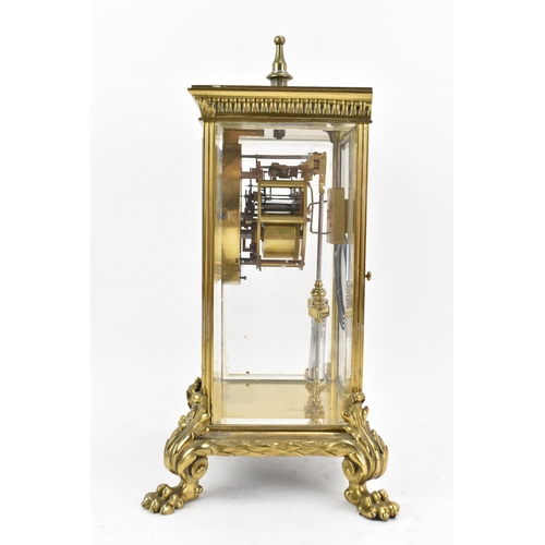 58 - A late 19th century French gilt metal and beveled glass mantle clock, the dial having a floral paint... 