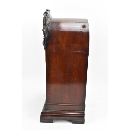 60 - A Victorian mahogany 8 day bracket clock, the arched top case having floral moulding, the 7