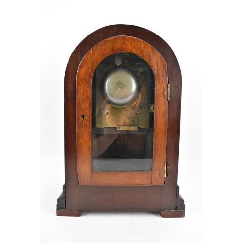 60 - A Victorian mahogany 8 day bracket clock, the arched top case having floral moulding, the 7