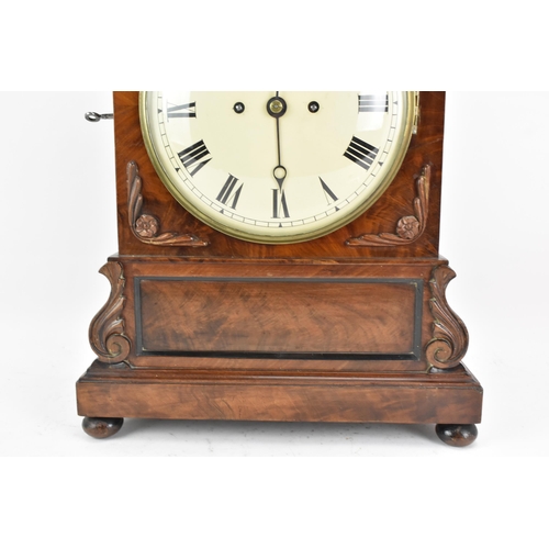 61 - A Victorian mahogany 8 day bracket clock, the case having an arched top, flower head and reeded moul... 