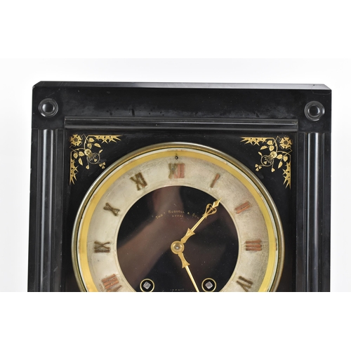 64 - A Victorian black slate 8 day mantle clock, the dial having a silvered chapter ring with gilt hands,... 