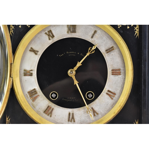 64 - A Victorian black slate 8 day mantle clock, the dial having a silvered chapter ring with gilt hands,... 