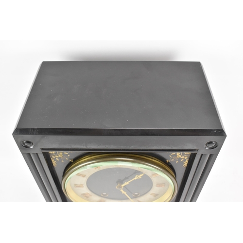 64 - A Victorian black slate 8 day mantle clock, the dial having a silvered chapter ring with gilt hands,... 