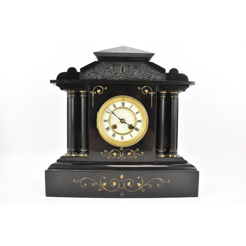 65 - A late 19th century French 8 day mantle clock, the case of architectural form with a scene of cherub... 