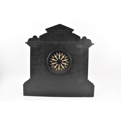 65 - A late 19th century French 8 day mantle clock, the case of architectural form with a scene of cherub... 