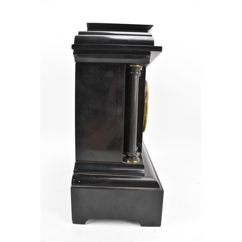 65 - A late 19th century French 8 day mantle clock, the case of architectural form with a scene of cherub... 