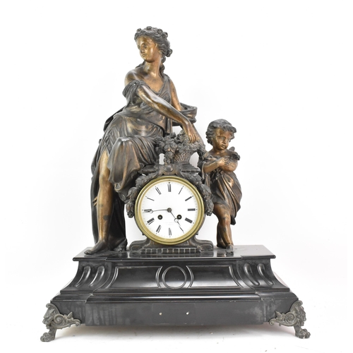 66 - A 19th century black slate 8 day mantle clock, the case surmounted by a spelter cherub and classical... 