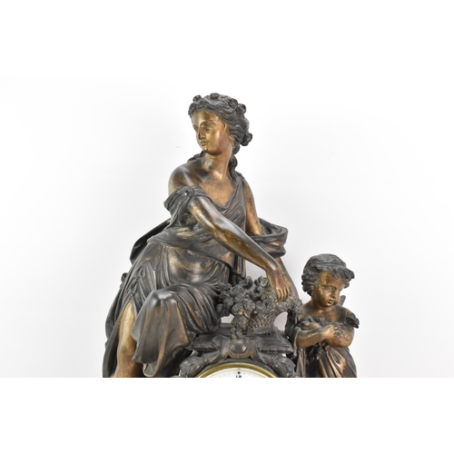 66 - A 19th century black slate 8 day mantle clock, the case surmounted by a spelter cherub and classical... 