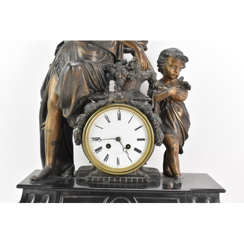 66 - A 19th century black slate 8 day mantle clock, the case surmounted by a spelter cherub and classical... 