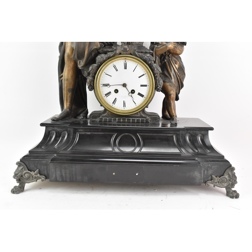 66 - A 19th century black slate 8 day mantle clock, the case surmounted by a spelter cherub and classical... 