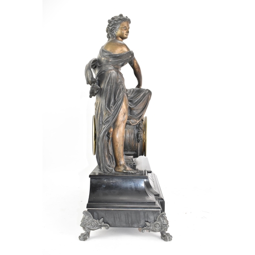 66 - A 19th century black slate 8 day mantle clock, the case surmounted by a spelter cherub and classical... 