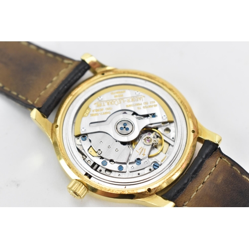 68 - A Jaeger LeCoultre Master Control, automatic, gents, 18ct gold wristwatch, the silvered dial having ... 