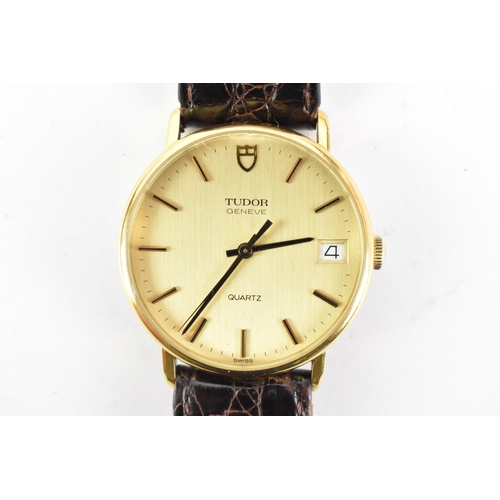 69 - A Tudor, quartz, gents, gold plated wristwatch, having a gilt dial with baton markers, centre second... 