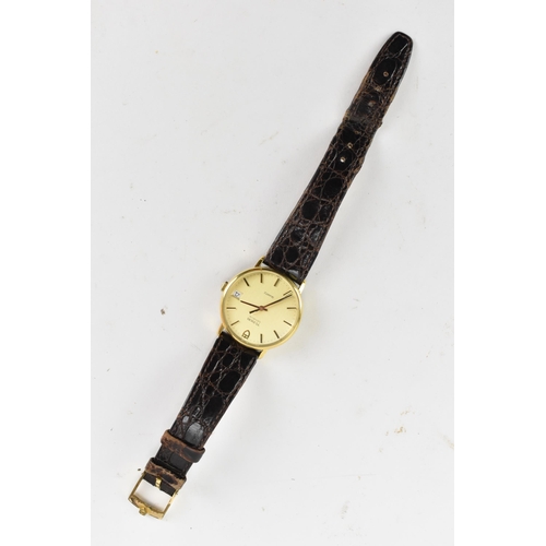 69 - A Tudor, quartz, gents, gold plated wristwatch, having a gilt dial with baton markers, centre second... 