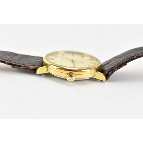 69 - A Tudor, quartz, gents, gold plated wristwatch, having a gilt dial with baton markers, centre second... 