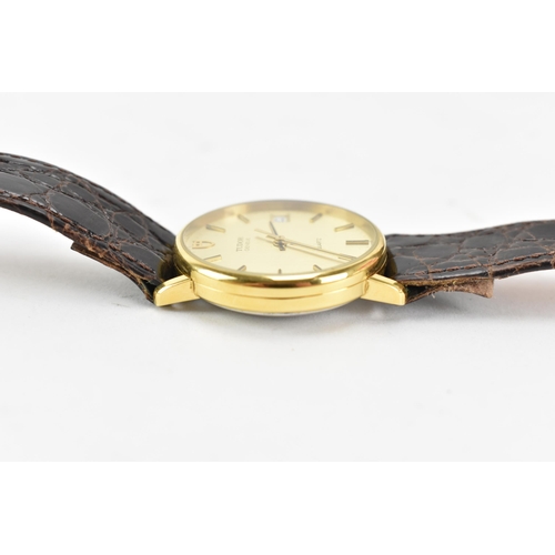 69 - A Tudor, quartz, gents, gold plated wristwatch, having a gilt dial with baton markers, centre second... 