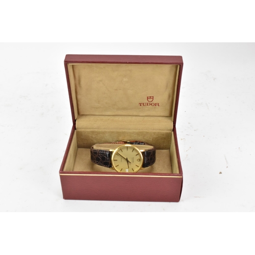 69 - A Tudor, quartz, gents, gold plated wristwatch, having a gilt dial with baton markers, centre second... 