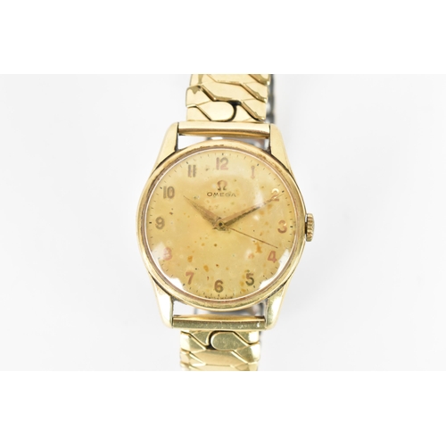 7 - An Omega, manual wind, gents, 9ct gold wristwatch, circa 1963, the dial having Arabic numerals, on a... 