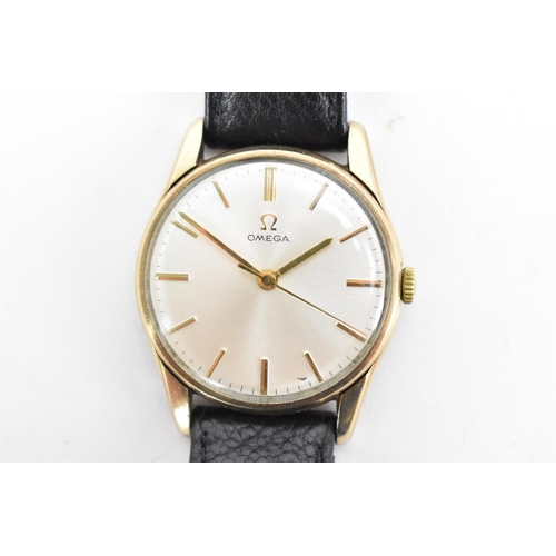 71 - An Omega, manual wind, gents, 9ct gold wristwatch, circa 1959, having a silvered dial with centre se... 