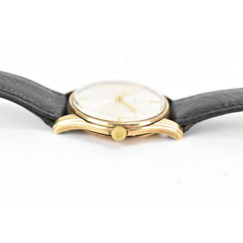 71 - An Omega, manual wind, gents, 9ct gold wristwatch, circa 1959, having a silvered dial with centre se... 