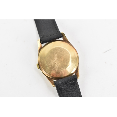 71 - An Omega, manual wind, gents, 9ct gold wristwatch, circa 1959, having a silvered dial with centre se... 