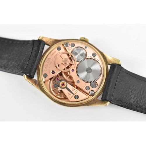 71 - An Omega, manual wind, gents, 9ct gold wristwatch, circa 1959, having a silvered dial with centre se... 