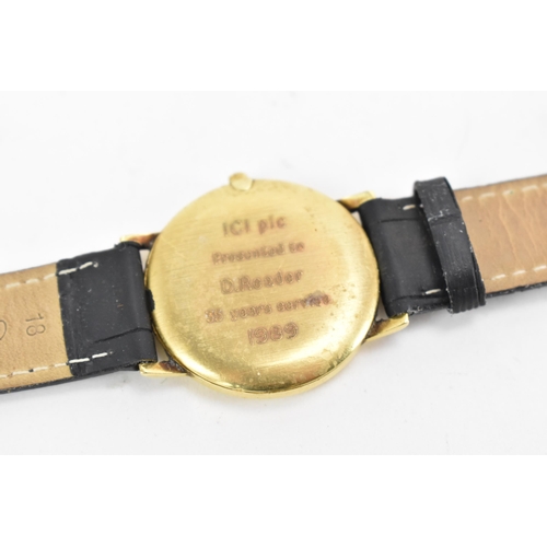 72 - A Garrard, quartz, gents, 18ct gold wristwatch, circa 1989, having a gilt dial with baton markers an... 