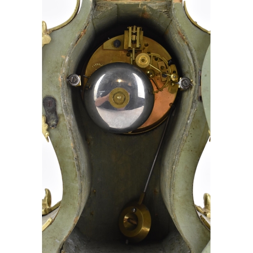 78 - A late 19th century French mantle clock, the ornate case having gilt metal scroll mounts and a flora... 