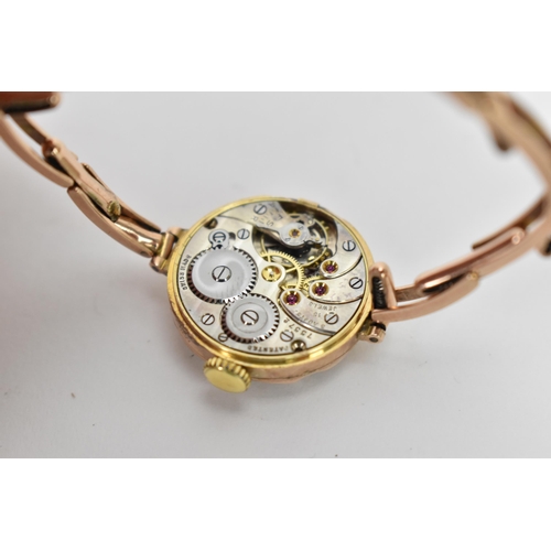 8 - A J.W Benson, manual wind, ladies, 9ct gold wristwatch, circa 1930s, having a silvered dial with Ara... 